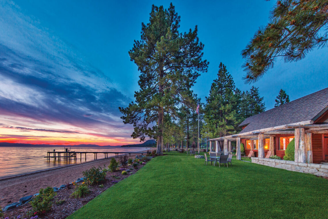 lakefront home with beautiful sunset